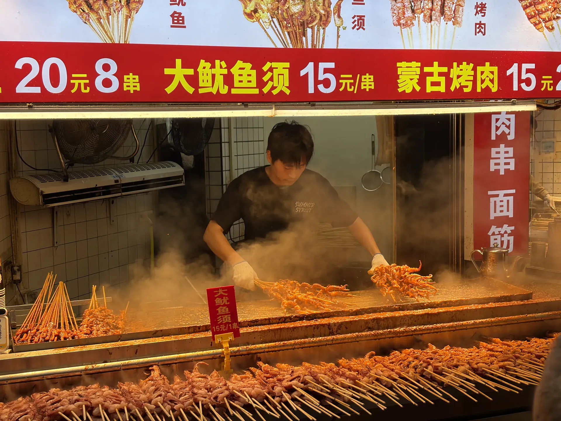A theatrical skewer vendor